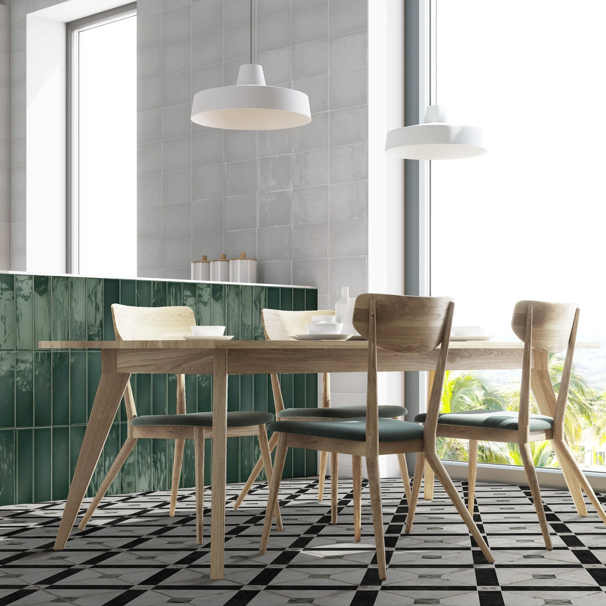 Estudio Cerámico Borriana 'Green', donkergroene wandtegels in een eethoek met houten tafel en een zwart-wit geblokte vloer
