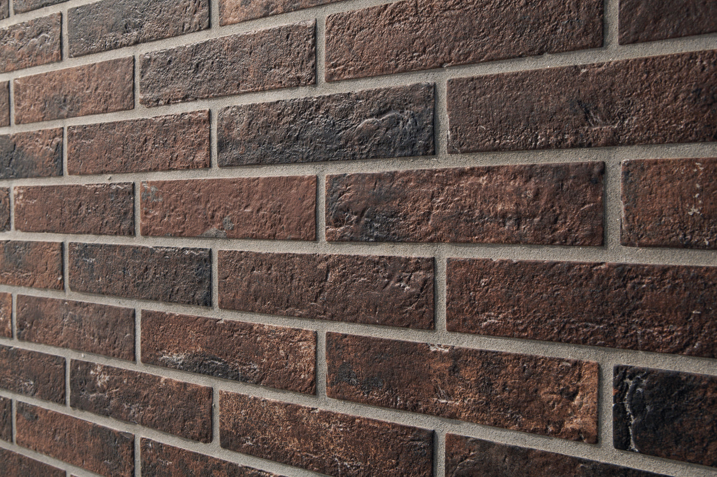 Vloertegel Bristol 'Umber' zwart-bruin 6,6x25cm