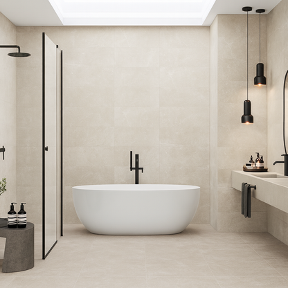 Keraben Bleuemix 'Taupe Soft', taupe vloer- en wandtegels in een badkamer met vrijstaand bad, hanglampen en een daklicht