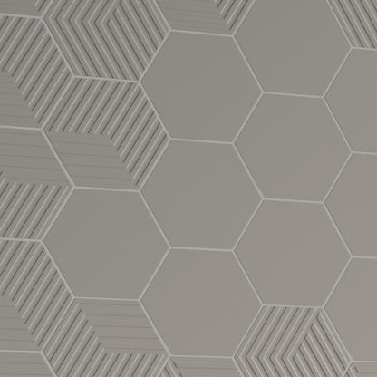 Argenta Cerámica Gallery 'Taupe', close-up van taupe zeshoekige wandtegels, glad en deels Cube met lijnreliëf