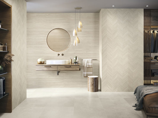 Baldocer Cerámica Larchwood 'Zig Maple', crèmekleurige houtlook wandtegels in een badkamer met ronde spiegel